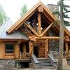 This rustic log cabin has a main floor master suite and a huge great room with back to back fireplaces that warm the outside porch as well porches wrap around the home giving you views and a place to put your rocking chairs guests or family will be comfortable in the second floor bedroom with its loft. 1