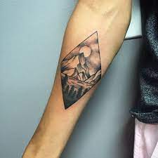 I also thought about a mountain landscape of some sort or maybe a recognizable face like el cap, the diamond, or devils tower. Best Of 75 Mountain Tattoos Enhance Your Style Tattooli Com
