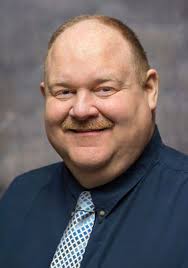 DR. ADRIEN L. BENNINGS