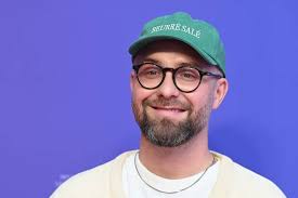 Singer Mark Forster, the German voice of Branch comes to the premiere of  Animaltion film Trolls