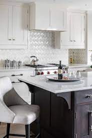 You might say this remodeled oregon kitchen is contemporary, but blink once and you'll see warm wood floors, wood countertops, open cottagey shelves, and timeless white cabinets with universal appeal. Transitional Kitchen Designs You Will Absolutely Love Luxury Home Remodeling Sebring Design Build