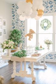 Guests bring small gifts for the expectant mother. The Sweetest Blue And White Baby Shower We Ever Did See