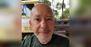 ROBERT E. "BOB" HOLMAN Obituary