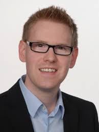 Reducing Waiting Times at Charging Stations with Adaptive Electric Vehicle  Route Planning