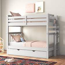 Far from being simply two beds, the lower bed is actually a futon that can be easily converted from a bunk beds twin over full to a chair. Harriet Bee Treva Tall Twin Over Twin Bunk Bed With Trundle Reviews Wayfair
