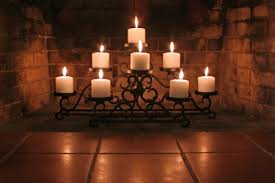 Decorating A Fireplace For Summer Doityourself Com Candles In Fireplace Fireplace Candelabra Candles Wallpaper