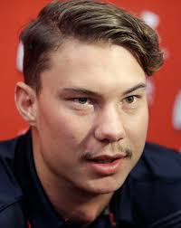 COLLEGE FOOTBALL: Utah quarterback Wilson an unlikely hero