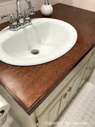 A modern bathroom is a great place to use a wood vanity. How Do Wooden Countertops Really Hold Up Exquisitely Unremarkable