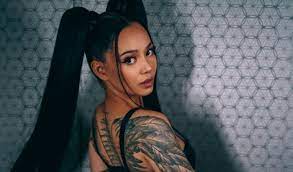 In may 2021, she released her debut single build a bitch. Following Smash Debut Single Bella Poarch To Co Headline Virgil S Mania Tour In September Tubefilter