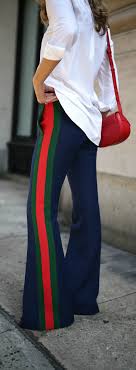 Black And White Striped Flare Pants Outfit Trend Memo Day 2 Luxe Leisure Multi Colored Striped Flare Pants White Button Down Small Red Handbag Black Sandals W Fashion Fashion Week Fashion Pants