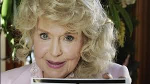 Settlement in Elly Mae Clampett Barbie doll suit