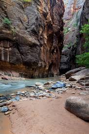 A slot canyon through some of the most beautiful rock forms in the american southwest. Hiking The Narrows In Zion National Park Utah With Vezzani Photography