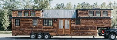 Our log cabin siding can either be painted or stained. The Denali Xl Is A Spacious Rustic Tiny Home On Wheels