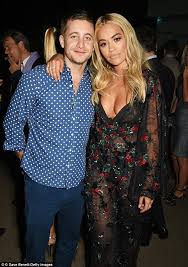 Andrew and rita dated for two years before that and it looks like they're going. Rita Ora Gets Cosy With Tyrone Wood Despite Dating Andrew Watt Daily Mail Online