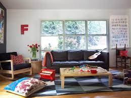 Think baskets, floating shelves, cushy furniture and colourful carpets! How To Create A Family Friendly Living Room Hgtv