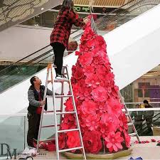 Creative Christmas Tree Covered With Red Flowers For Christmas Day Decoration In Mall Christmas Props Gingerbread Christmas Decor Creative Christmas Trees
