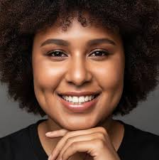 prompt : A hyper-realistic cosplay photo of Trafalgar D. Law from One  Piece, (face according to photo reference). He is depicted as a real human  with sharp, defined facial features, light stubble,