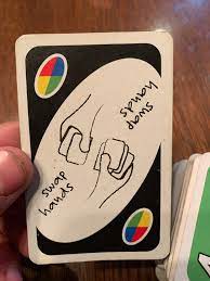 Can only play a +2 on a +2 if holding a +2 and +4. Is This An Example Card Or An Absolute Swap Hands Card Unocardgame