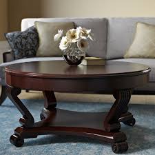 A simple round top white coffee table like this makes a great addition to your living room or a bedroom. Coffee Tables Blackbean Interiors