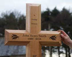 Blanford variegated black stone with starburst carving. The Mega Memorial Cross Uk Memorials