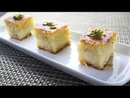 How To Make Basbousa With Cream Semolina Cake With A Cream Cheese Filling Cream Cheese Recipes Baking Sweets Delicious Desserts