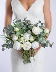 A tender neutral wedding bouquet in cream and blush plus pale eucalyptus. Top 10 Diy Wedding Flowers Tips Sand And Sisal
