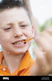 Boy boys male kids children gum hi-res stock photography and images