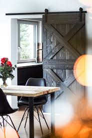 Closing off the bifold doors will give you. Wood And Metal In The Dining Room With Sliding Doors Reno Doors
