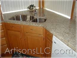 A lovely beige background is enriched with burgundy, gold, and gray veins. Santa Cecilia Granite Kitchen W Mark Frazer Flickr