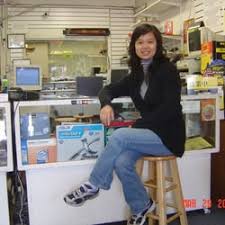 Businesswoman using laptop in coffee shop. Best Computer Shops Near Me August 2021 Find Nearby Computer Shops Reviews Yelp