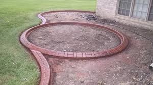 Pouring a concrete driveway takes 1 to 3 days on average, not including excavation or adding a concrete driveway increases a home's value and curb appeal. Concrete Edging Mn Landscape Curbing Companies Near Me