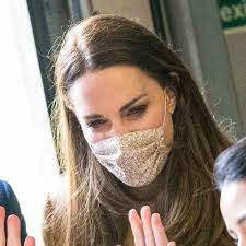 Kate in tan for visit to Newham Ambulance Station
