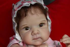 I am new to Reborns and have completely fallen in love with them. Can  someone explain the difference between a realborn and reborn? I've been  favoring realborn dolls, but want to know