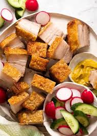 Plate Of Chinese Crispy Pork Belly With The Best Crackling In The World Pork Belly Slices On A Plate Ready To Crispy Pork Belly Pork Belly Recipes Pork Belly