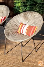 Simple Elegant And Versatile These Stackable Woven Chairs Let You Sit Back And Watch The Season Bloom Fr Metal Patio Furniture Home Decor Cool Room Designs