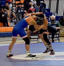 Local wrestlers and ballers continue regular season