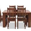 Each chair is made from a blend of solid acacia and engineered wood, and built on thin, tapered legs. 1