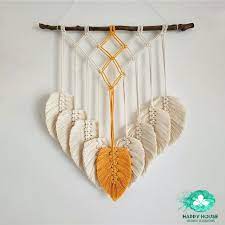 Learn how to make a bohemian style wall hanging decoration using macramé. Boho Decor Hand Knitted Fringe Macrame Wall Hanging Tapestry Etsy Diy Yarn Crafts Macrame Wall Hanging Feather Wall Hanging