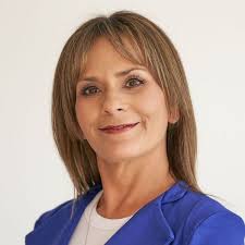 Dr. Rachel Harris was honored Friday with the Olean Zonta Club's Yellow  Rose Award. Harris was surprised with a yellow rose by Paula Bernstein,  Assistant Director of the Quick Center for the