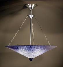 There is an additional clear patterned glass shade underneath the top shade that lets the majority of light from the light bulbs come down. Cobalt Cone By George Scott Art Glass Pendant Lamp Artful Home