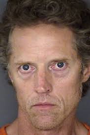 Man killed by officer had past murder conviction