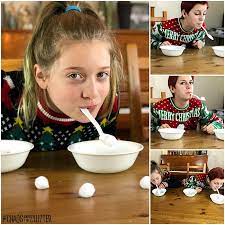 Separate a pile of 25 multicolored chocolate candies into five separate containers. Minute To Win It Games Christmas Edition