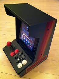 Here we have yet another beautiful example of a coffee table that comes with a whole bunch of classic 80s arcade games hidden under the hood. Ipad Arcade Cabinet Icade Now Shipping Macrumors