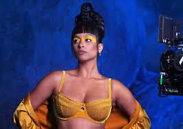 Lilly Singh in 'Savage x Fenty: Vol. 4' Show in Orange Honeycomb Bra – WWD