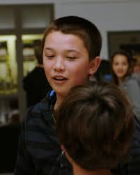 Curt Lowens tells St. Anne students to be grateful