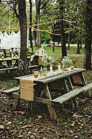 25 Casual Wedding Ideas For Relaxed Brides Picnic Table Wedding Wedding Picnic Reception Wedding Reception Layout