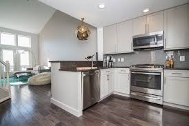If you have a small space for your kitchen, don't worry about dark cabinets taking the light out of the room! Contemporary With A Hint Of Aqua Contemporary Kitchen Dc Metro By Abbey Design Remodel Houzz