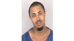 Man charged in shooting of KC woman