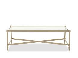 32 w coffee table round smoked glass top iron framework in gold finish modern. Contemporary Glass Top Cocktail Table In Gold Mathis Brothers Furniture