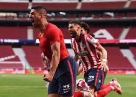 Atletico madrid's luis suarez, left, celebrates after scoring his side's second goal during their spanish la liga match against osasuna at the wanda metropolitano stadium in madrid, spain, sunday. Rejd5sbs26hsdm